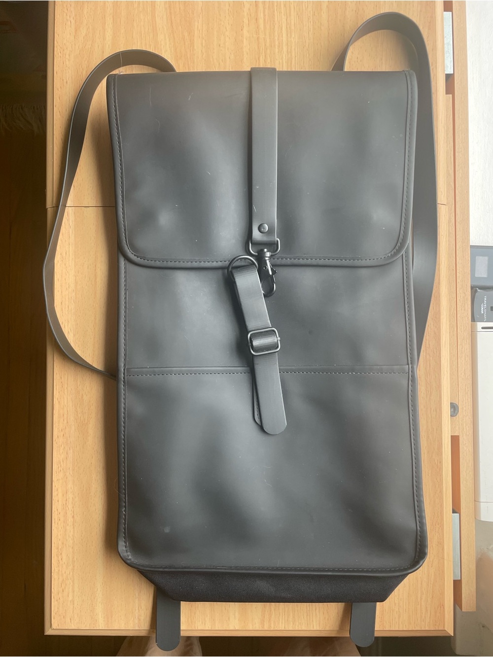 Rains Black Minimalist Backpack